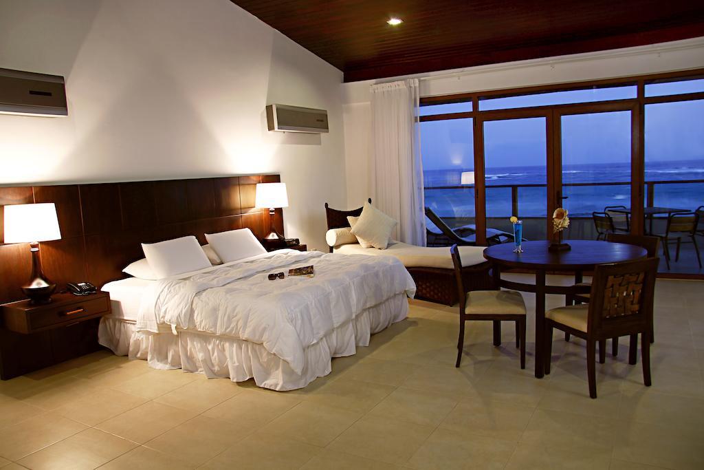 Iguana Crossing Boutique Hotel Puerto Villamil Pokoj fotografie