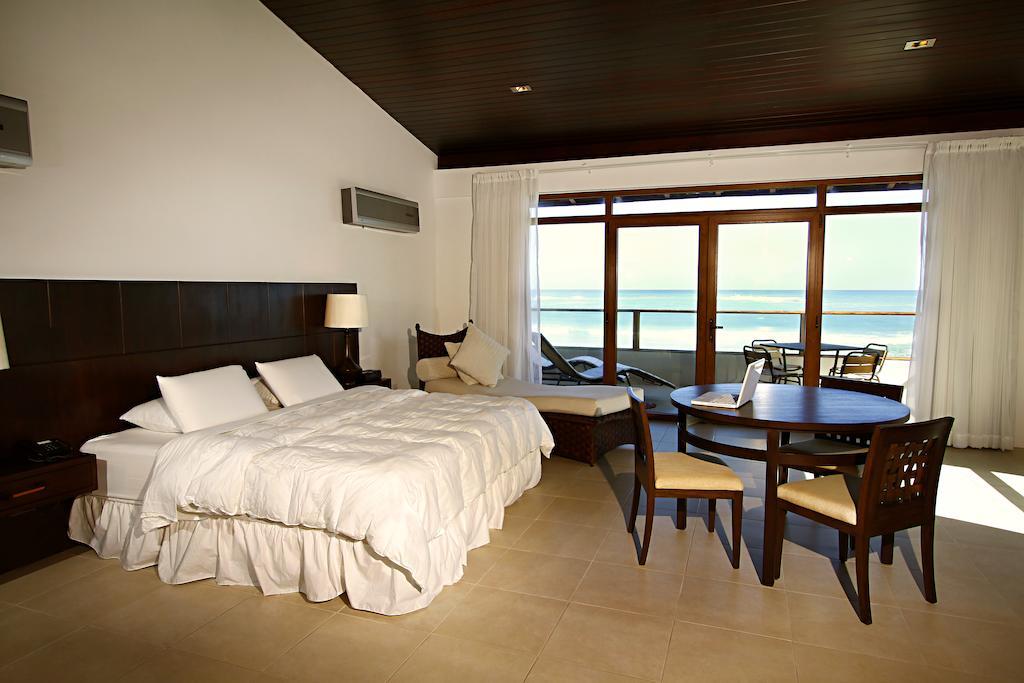 Iguana Crossing Boutique Hotel Puerto Villamil Pokoj fotografie