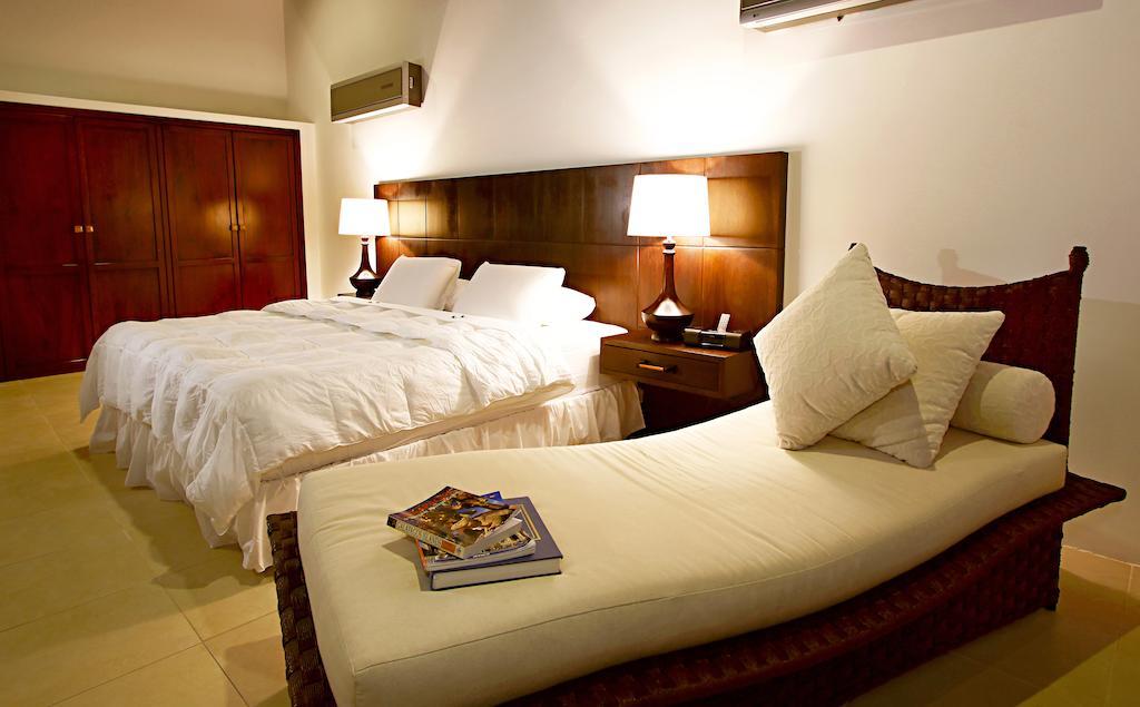 Iguana Crossing Boutique Hotel Puerto Villamil Pokoj fotografie