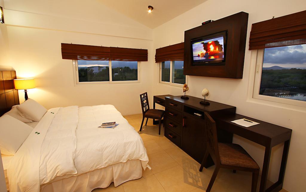Iguana Crossing Boutique Hotel Puerto Villamil Pokoj fotografie